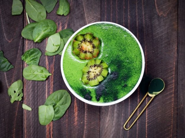 photo of green soup with spinach leaves