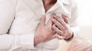 senior holding chest due to heart failure | feature | The Role and Connection Between Epigenome in Heart Failure